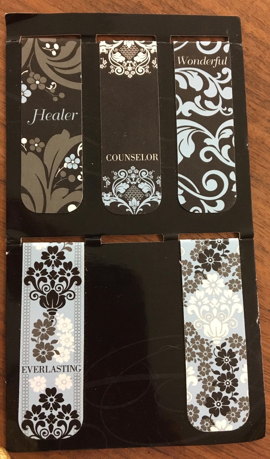 Eight pieces random but useful items. Religious, jewelry, note pad, wall art
