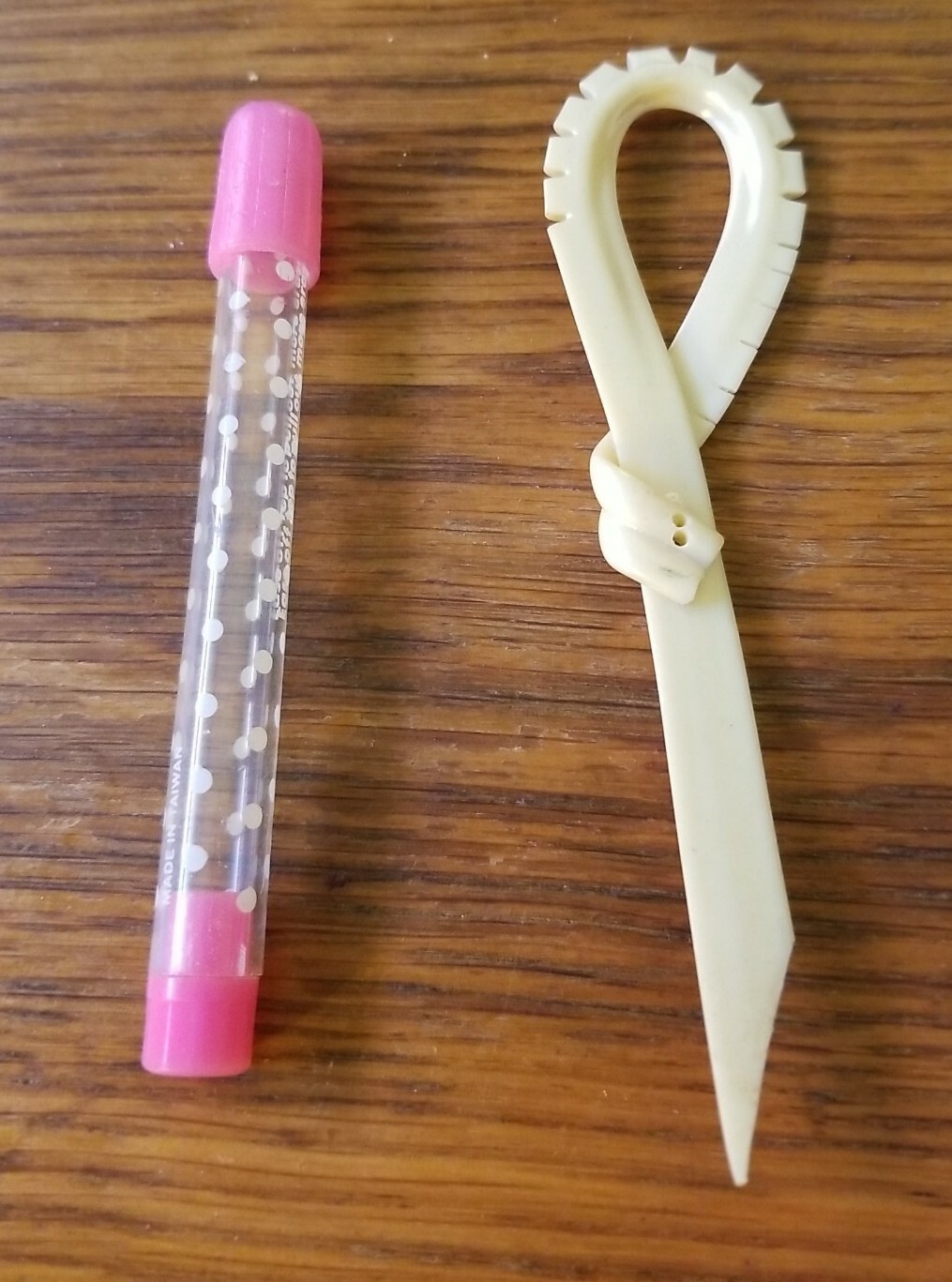2 unknown Plastic Items