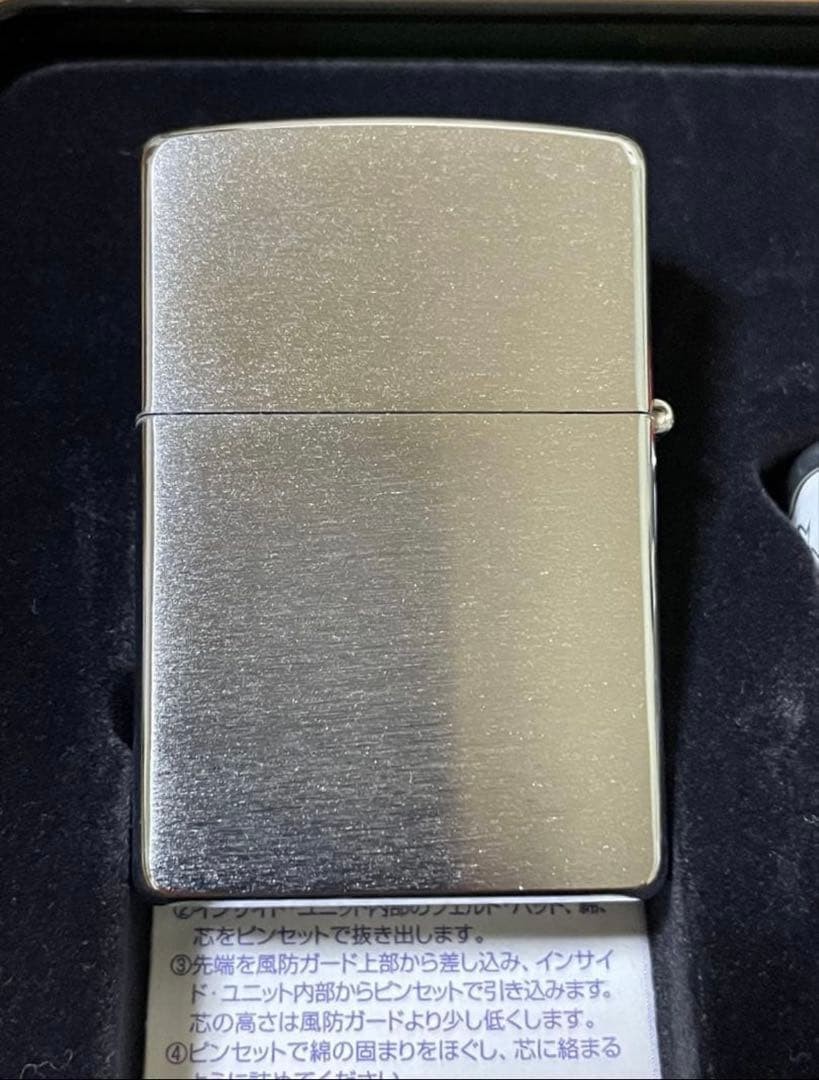 Zippo Stars and Stripes Metal Paste Made in 2003 with can case, oil, and flint,