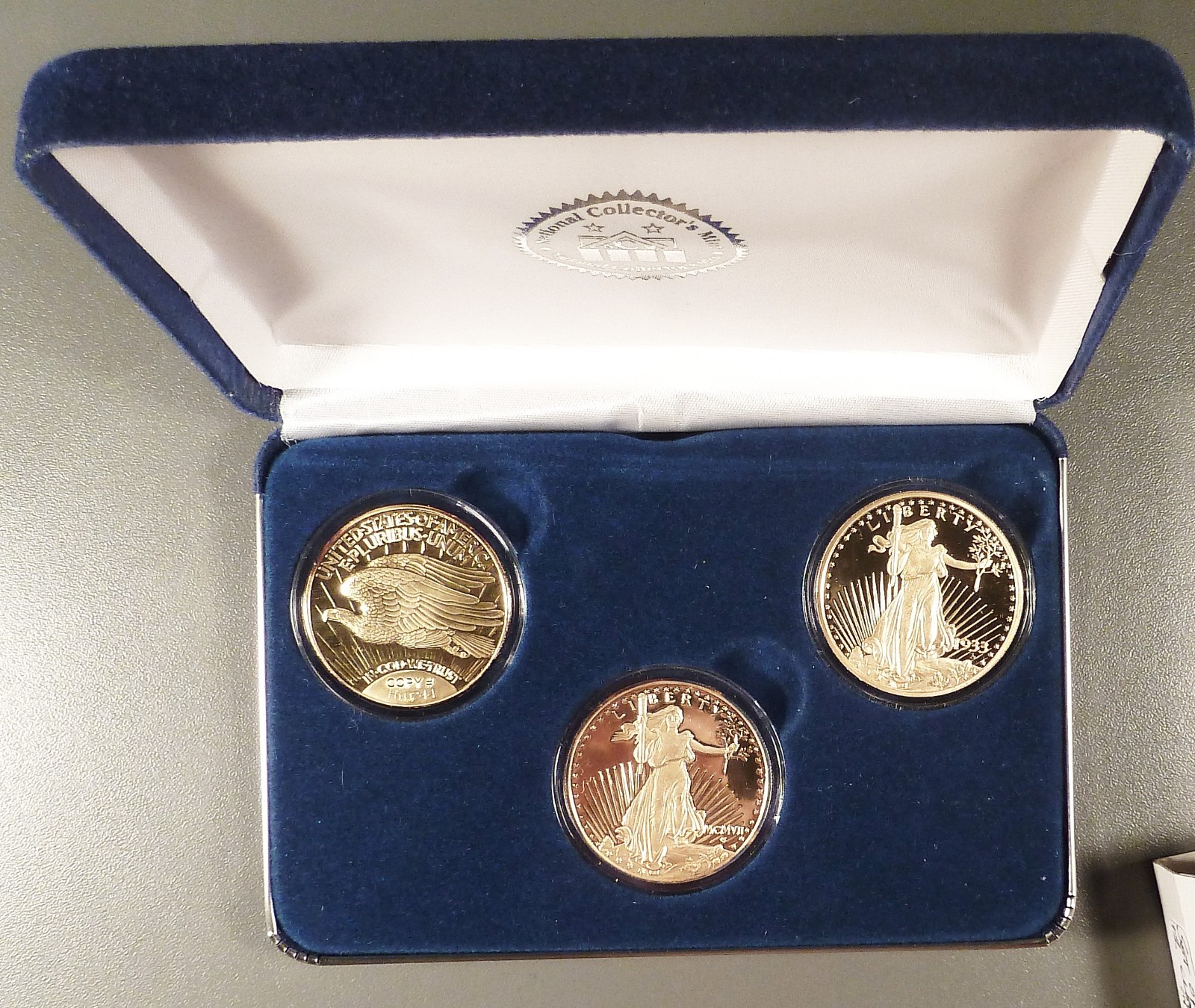 $20 Double Eagle Proof Set, 3 pc’s with 2 oz’s .999 Silver, 24K Gold Overlay.
