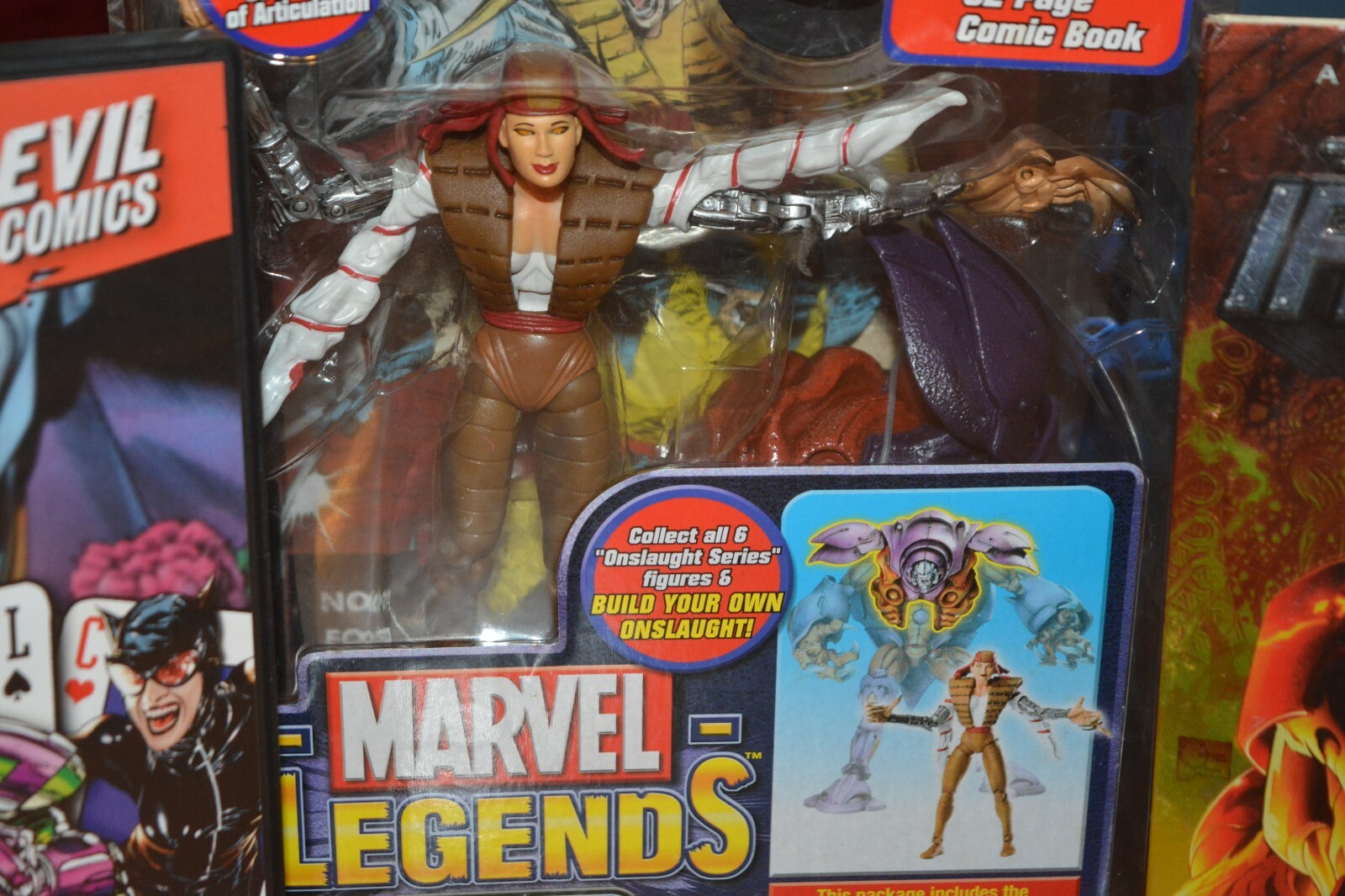 DVD COMIC BOOK COLLECTION WITH RARE MARVEL LEGENDS LADY DEATHSTROKE FIGURE