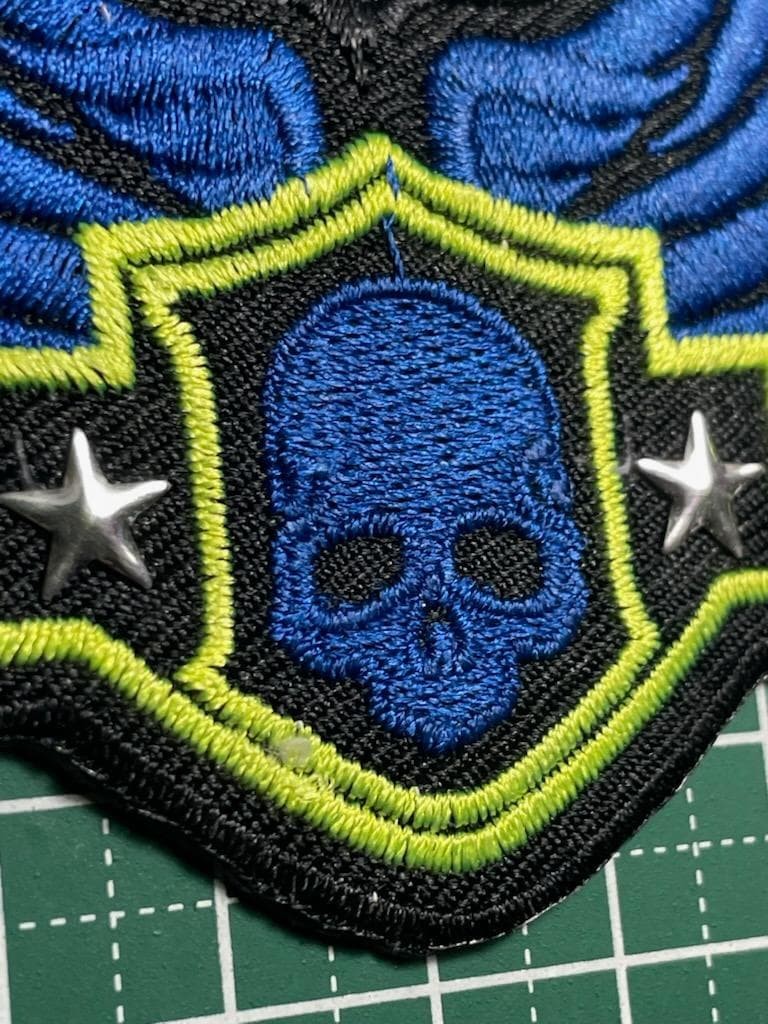 Discount available for multiple items with iron patch skull wing studs