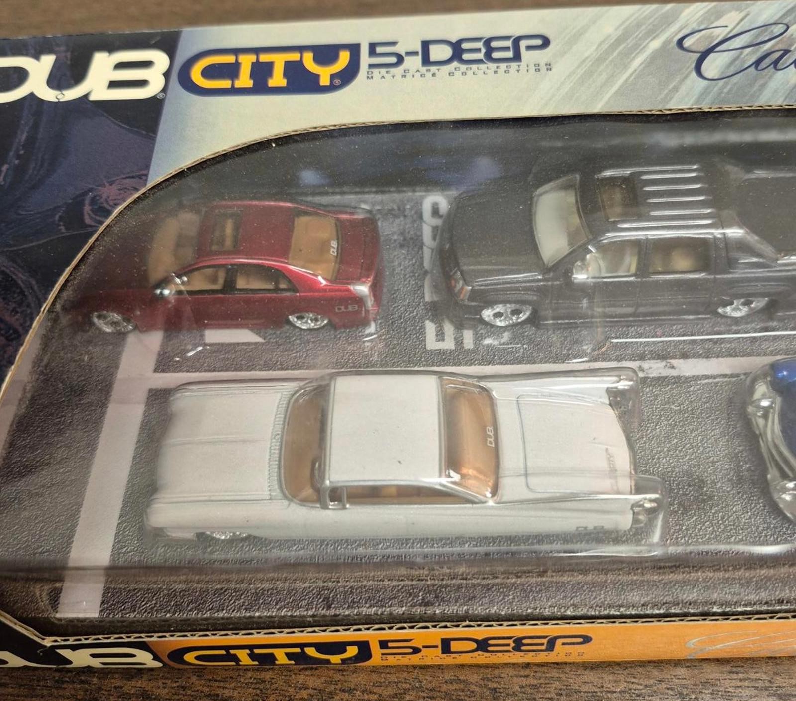 DUB City 5-Deep Cadillac Die Cast Model Set by Jada Toys