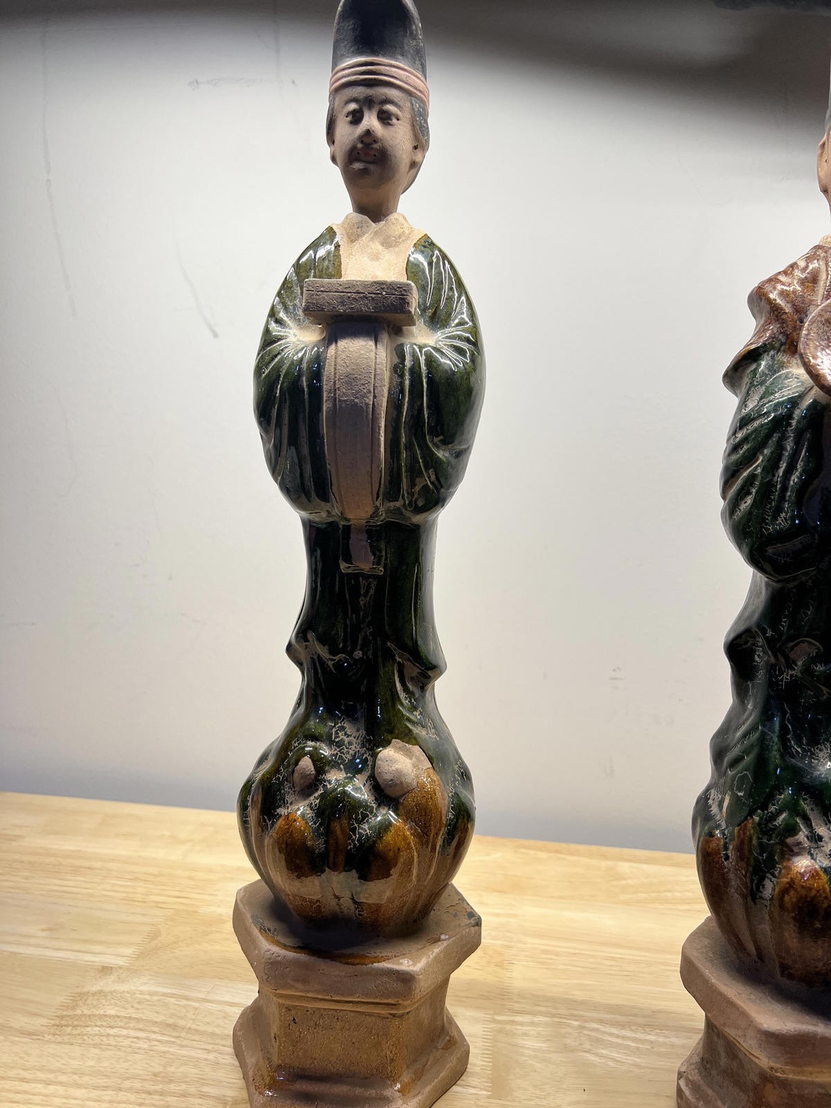 Pair of Chinese Ming style Sancai glazed attendant figures