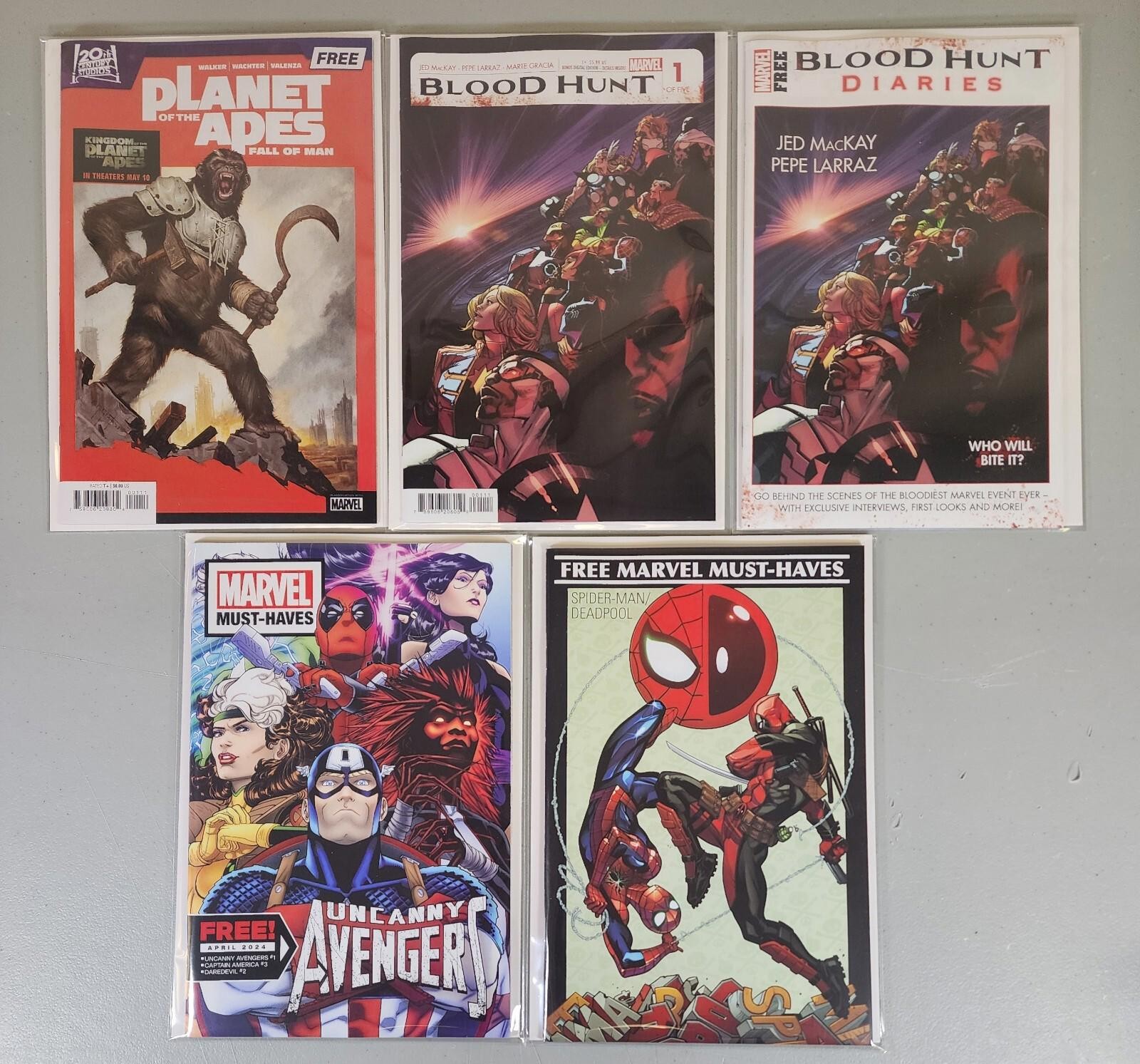 MARVEL MUST HAVES APRIL 2024 Blood Hunt Avengers Planet of the Apes Deadpool