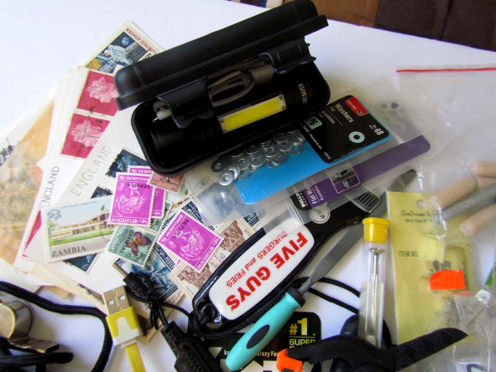 JUNK DRAWER LOT – 4+ lbs. – Coins, Stamps, Guitar Strap, jewelry. harmonica,etc.