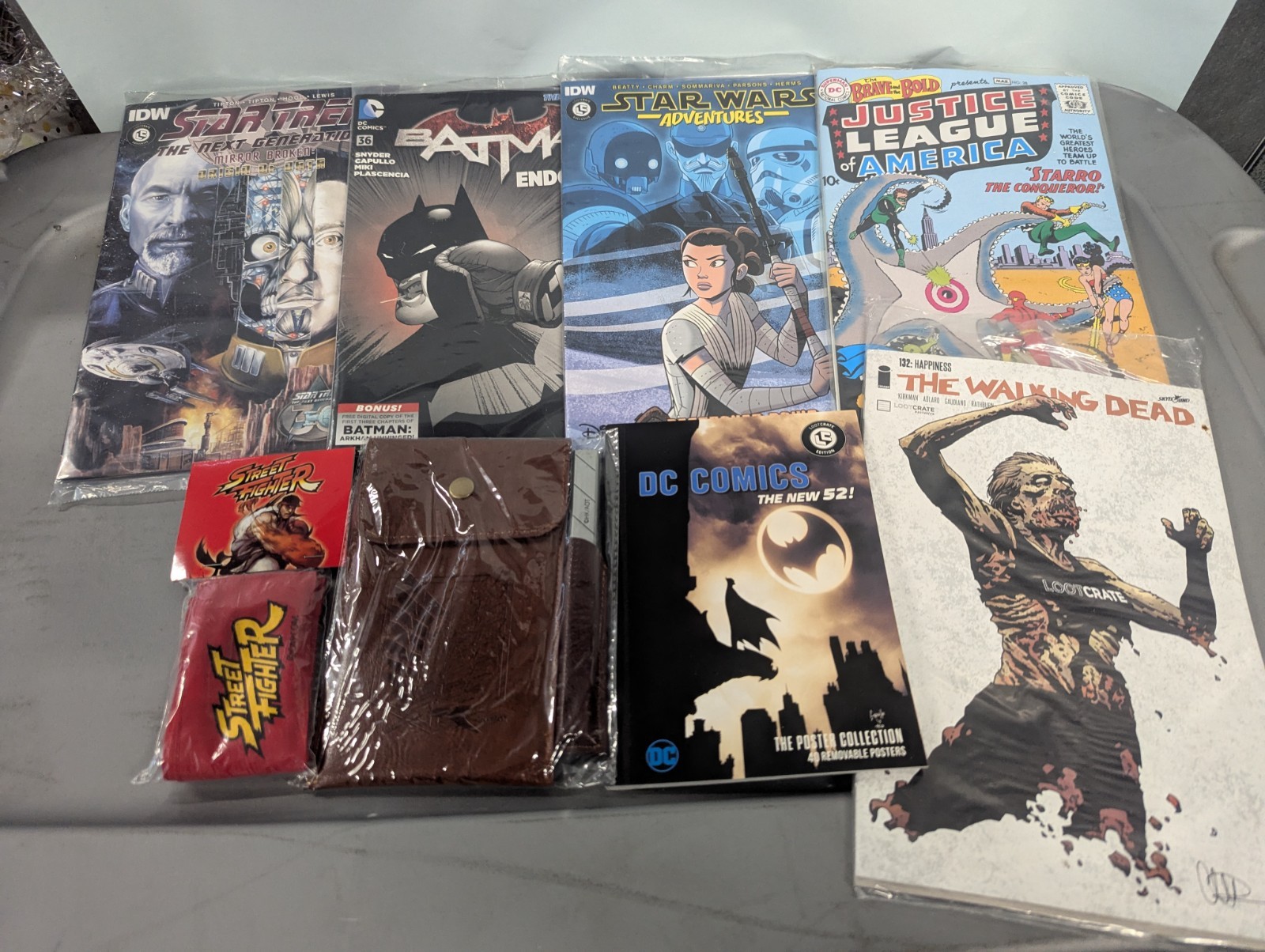 loot crate lot of comic books and accessories DC/ streetfighter/ walking dead