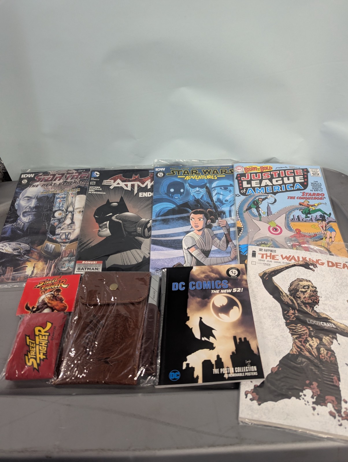 loot crate lot of comic books and accessories DC/ streetfighter/ walking dead