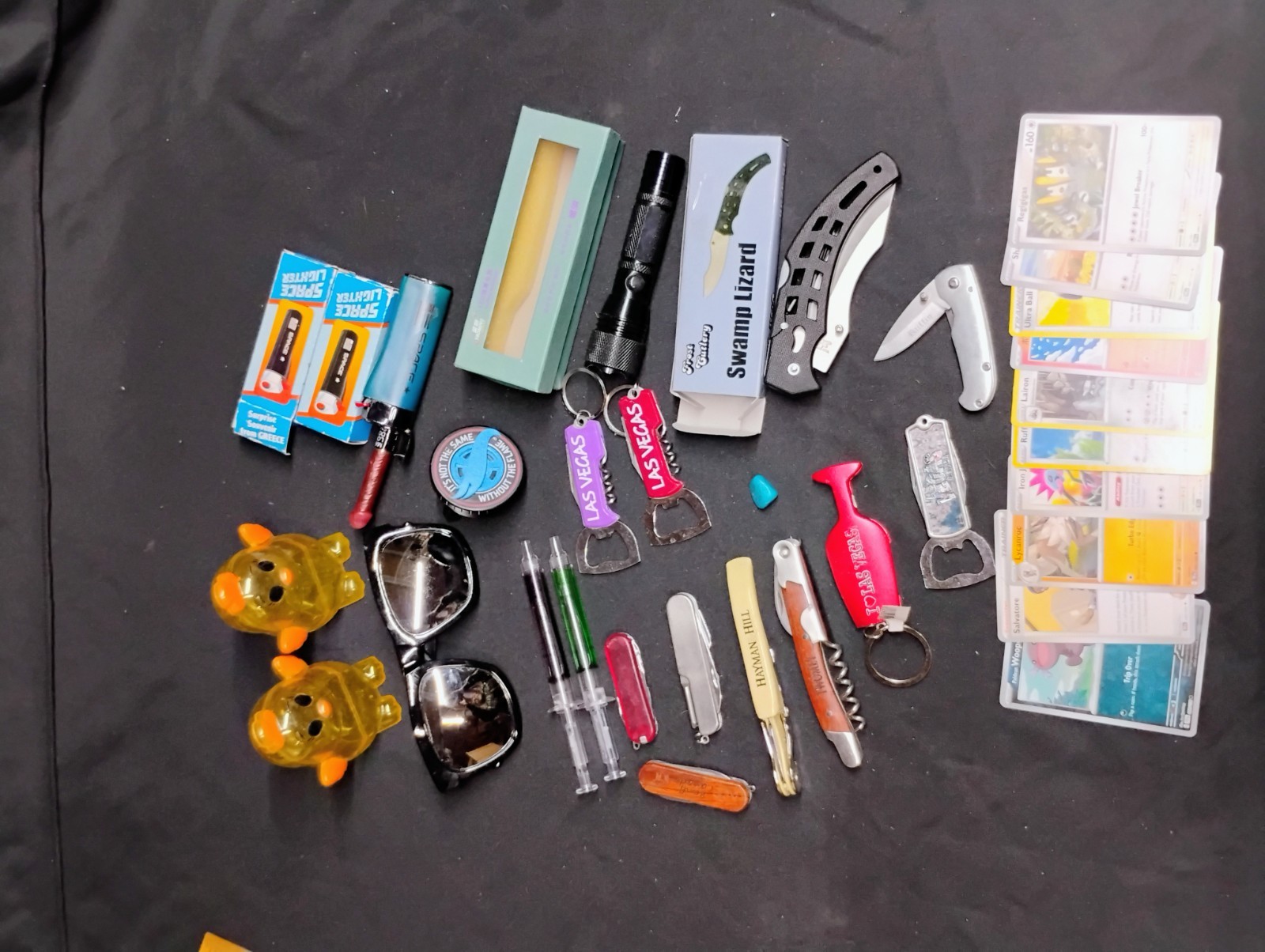 Collectible Junk Drawer Lot Pokémon Hot Wheels Las Vegas Led Knife Space Lighter
