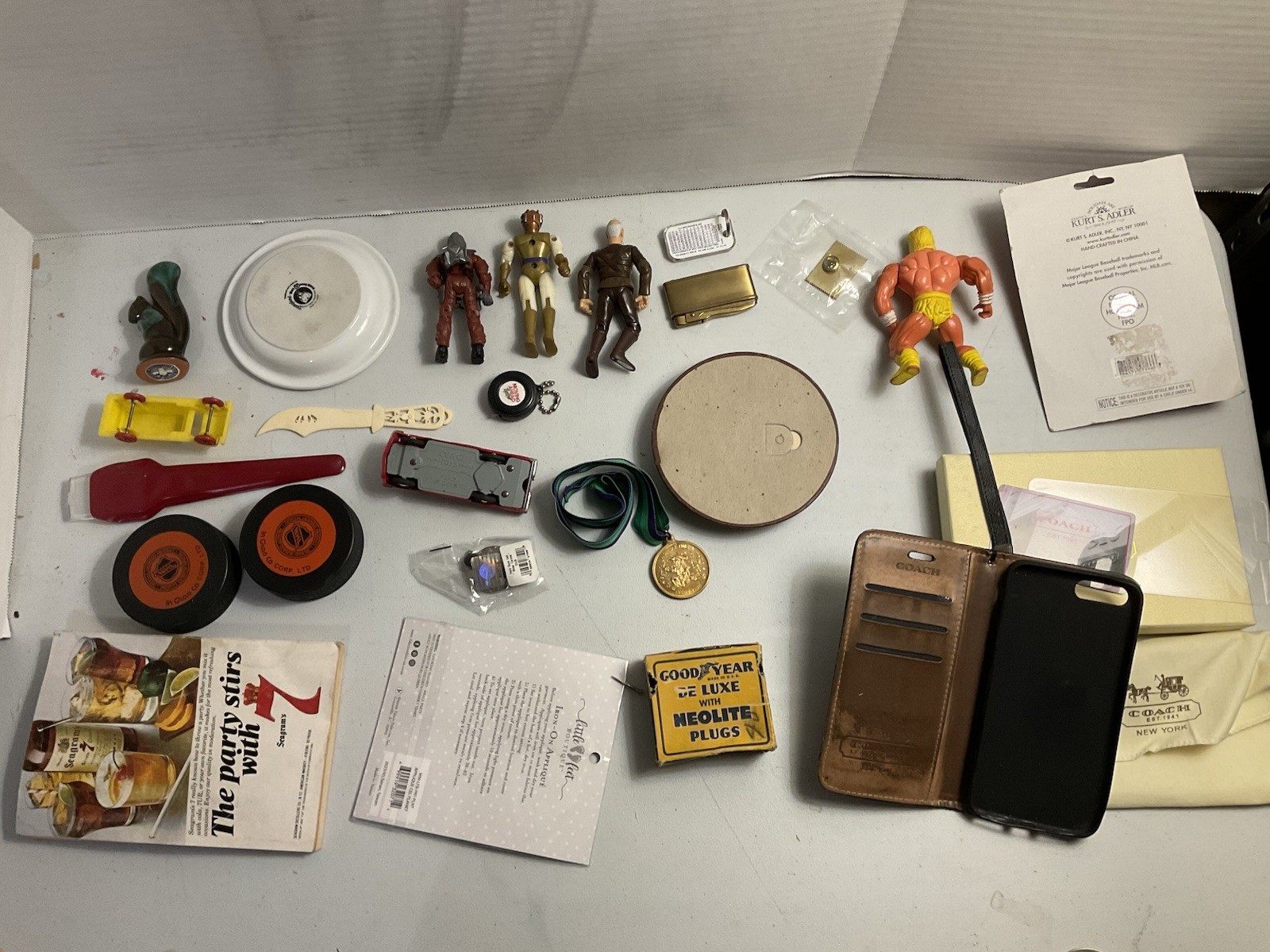Vintage large junk drawer Lot NHL hockey pucks action figures Corgi Car Misc.