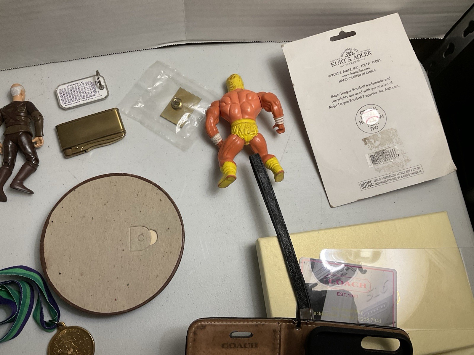 Vintage large junk drawer Lot NHL hockey pucks action figures Corgi Car Misc.