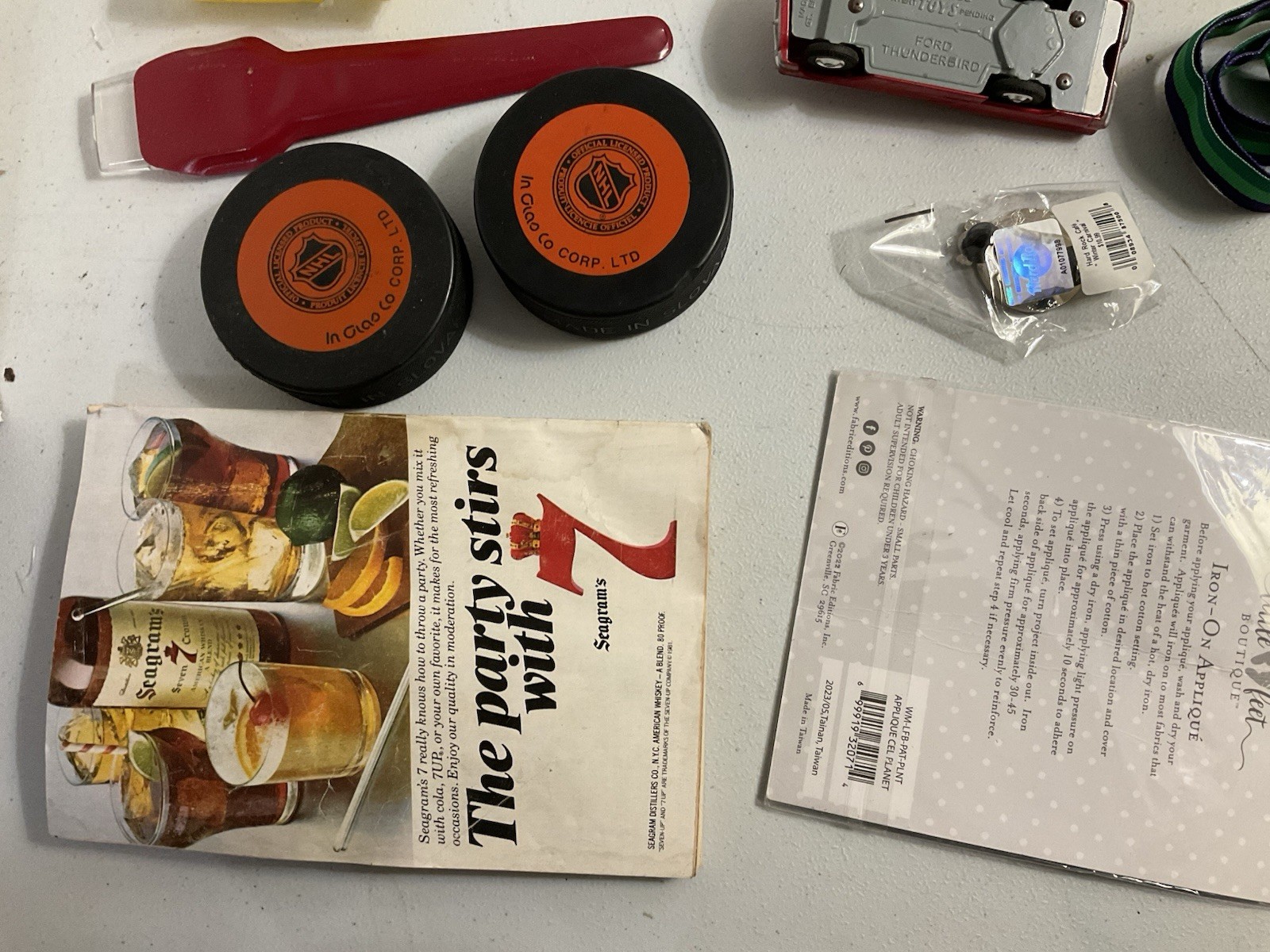 Vintage large junk drawer Lot NHL hockey pucks action figures Corgi Car Misc.