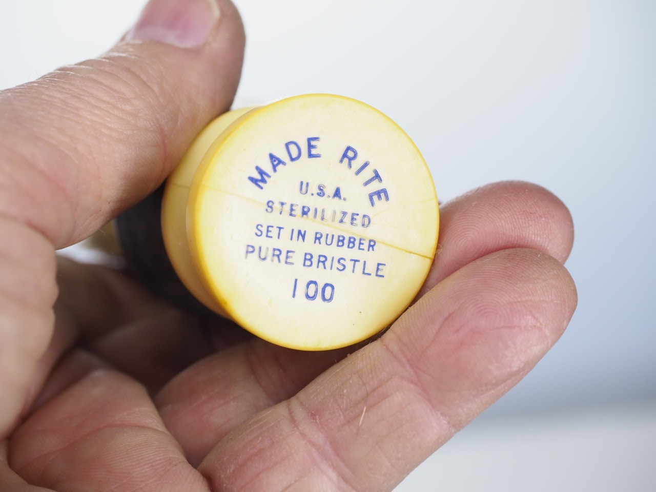 Junk drawer lot knife, figurine, pewter, matches.