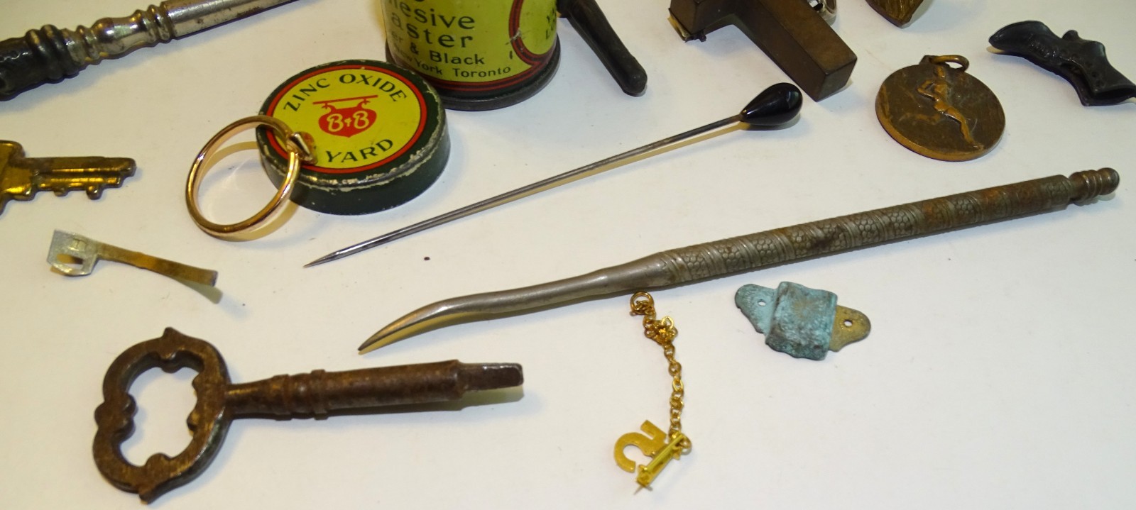 Junk found at estate sale; button hook, Keys, Rings, Shield Pin, Boot Charm, etc