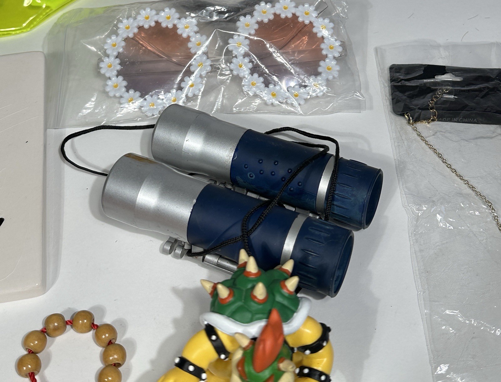 🔥 Mixed Junk Drawer Lot – Pokémon Lucario Pin, Bowser Figure, Nike Gear & More