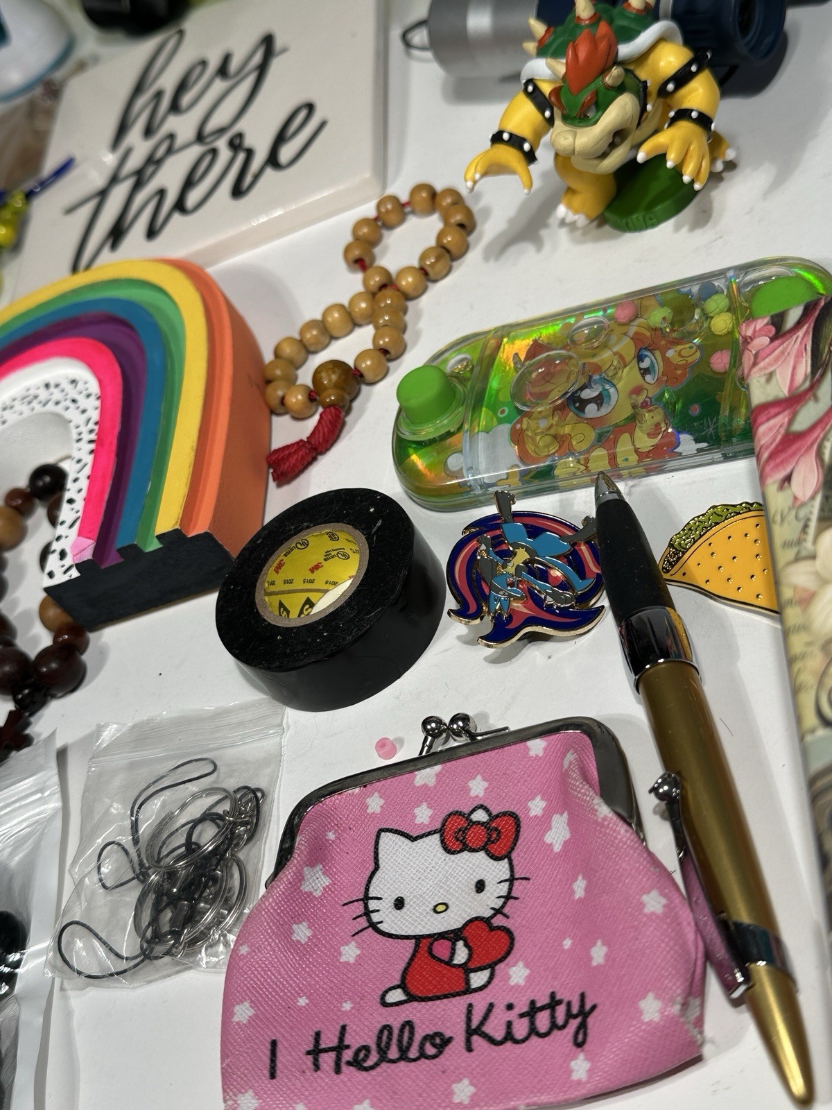 🔥 Mixed Junk Drawer Lot – Pokémon Lucario Pin, Bowser Figure, Nike Gear & More