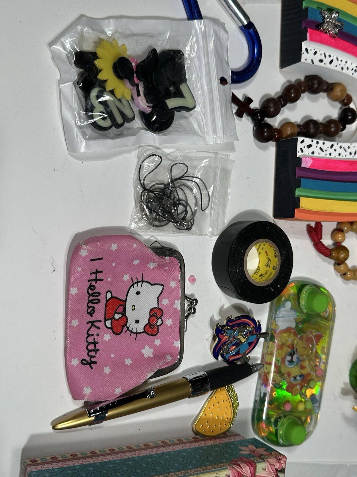 🔥 Mixed Junk Drawer Lot – Pokémon Lucario Pin, Bowser Figure, Nike Gear & More