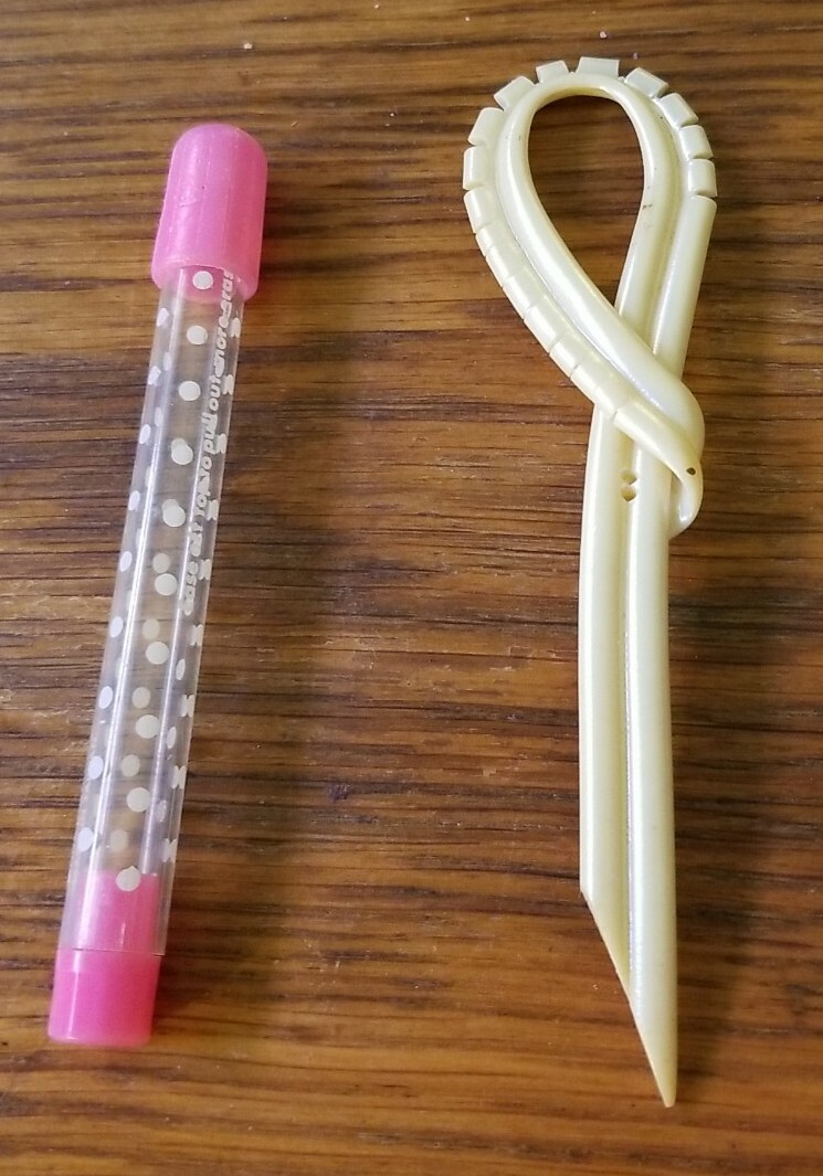 2 unknown Plastic Items