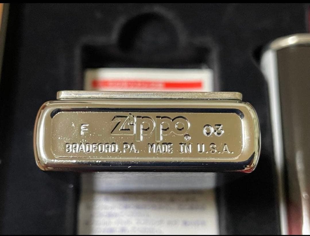 Zippo Stars and Stripes Metal Paste Made in 2003 with can case, oil, and flint,
