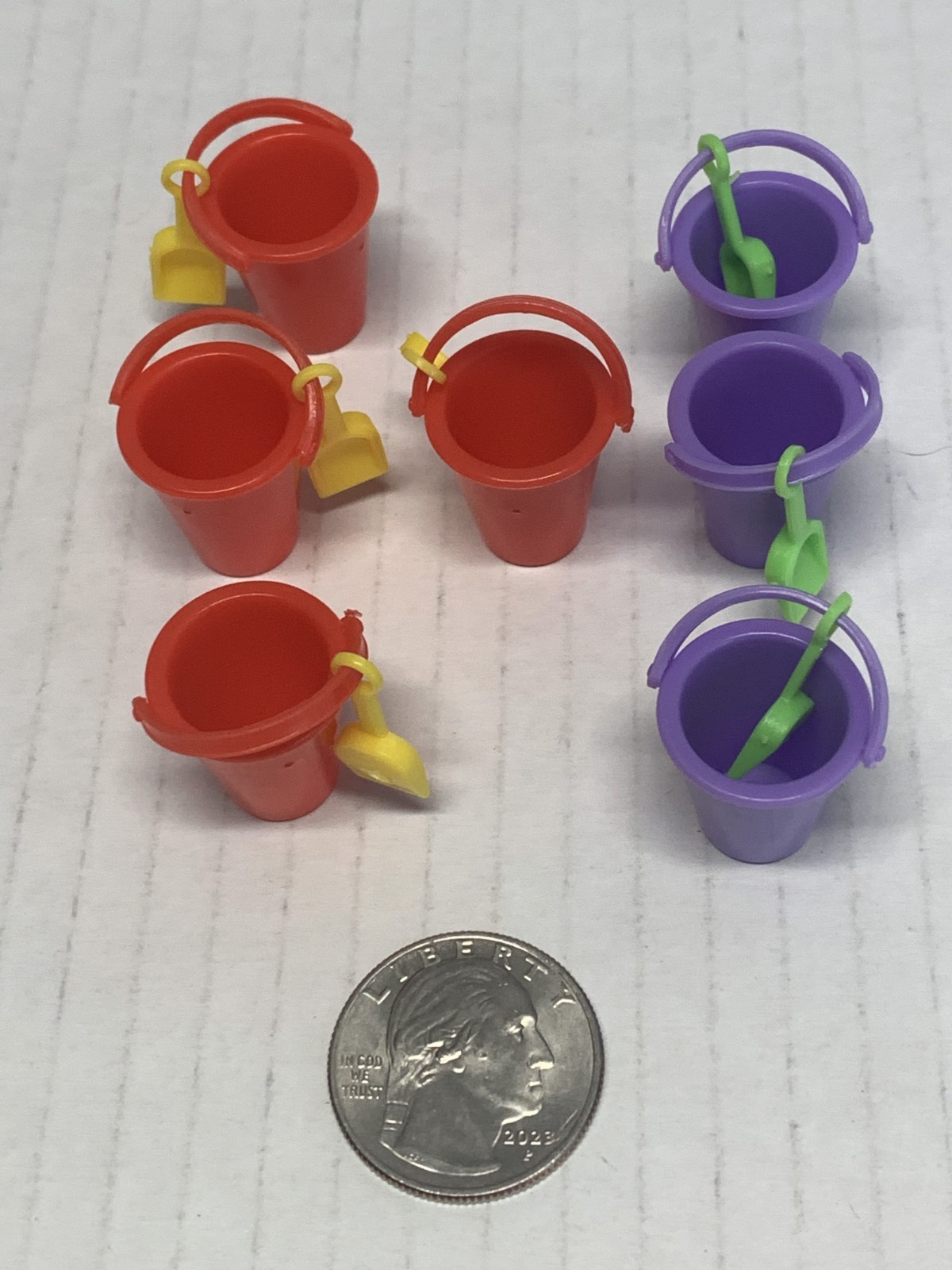 WORLDS SMALLEST MICRO TOY BOX SERIES 1,BUCKET W/SHOVEL X7. 4 RED & 3 PURPLE NICE