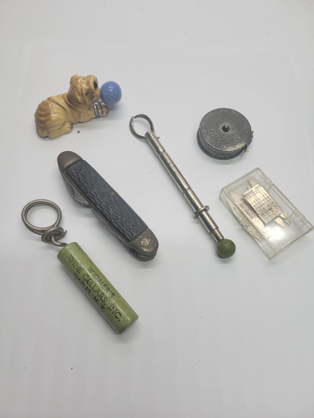 Vintage Junk Drawer Lot Pocket Knife Corkscrew Tape Measure Calendar Figurine