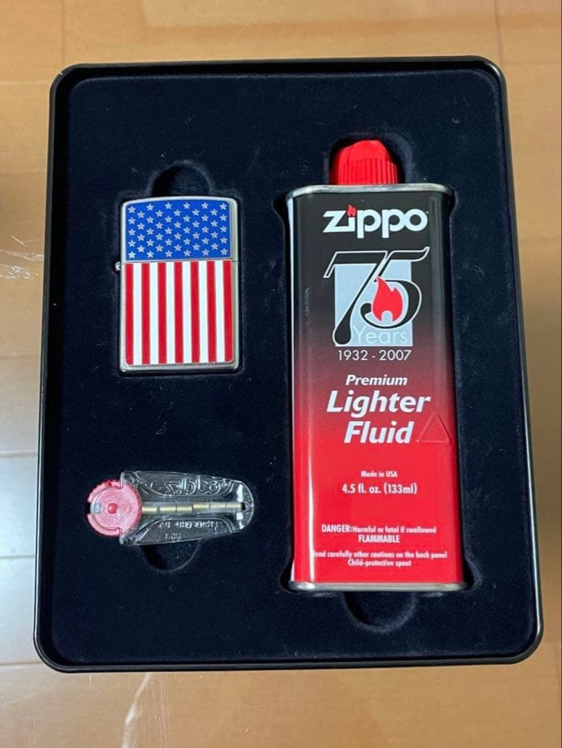 Zippo Stars and Stripes Metal Paste Made in 2003 with can case, oil, and flint,