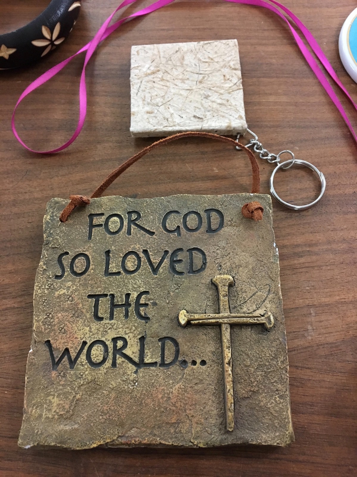 Eight pieces random but useful items. Religious, jewelry, note pad, wall art