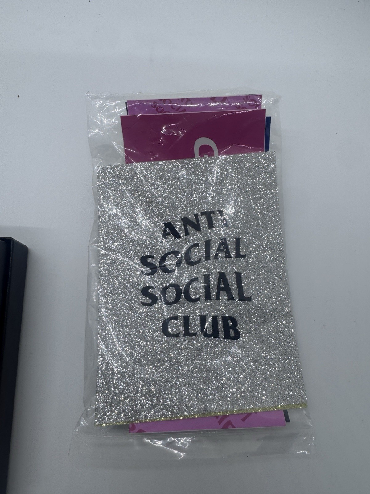 Lot Of Anti Social Social Club Items Towel, Tape, Stickers And No Regrets Zippo
