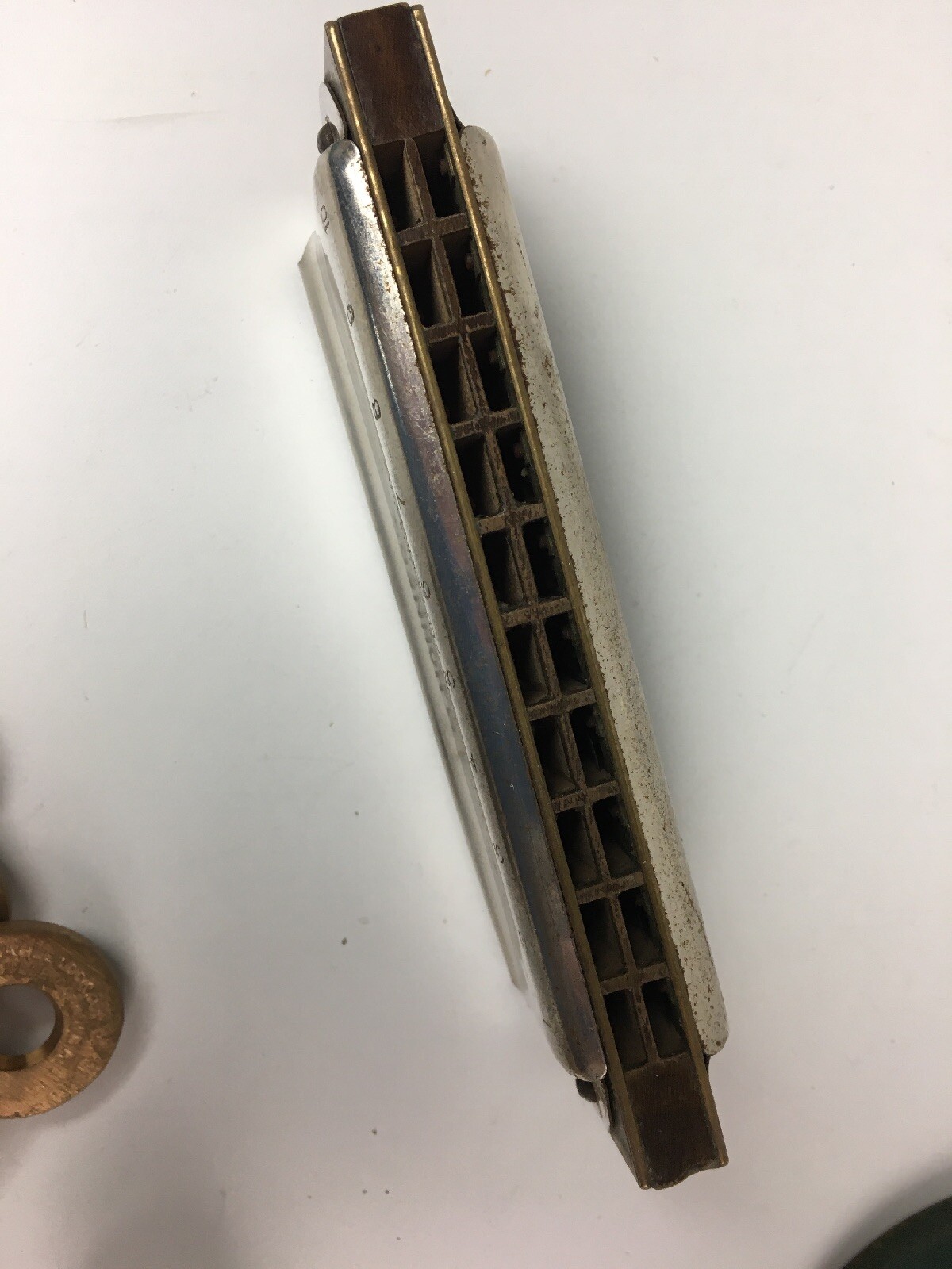 Mixed vintage lot – Hohner harmonica, Revlon, Eagle lock keys, Presbytarian coin