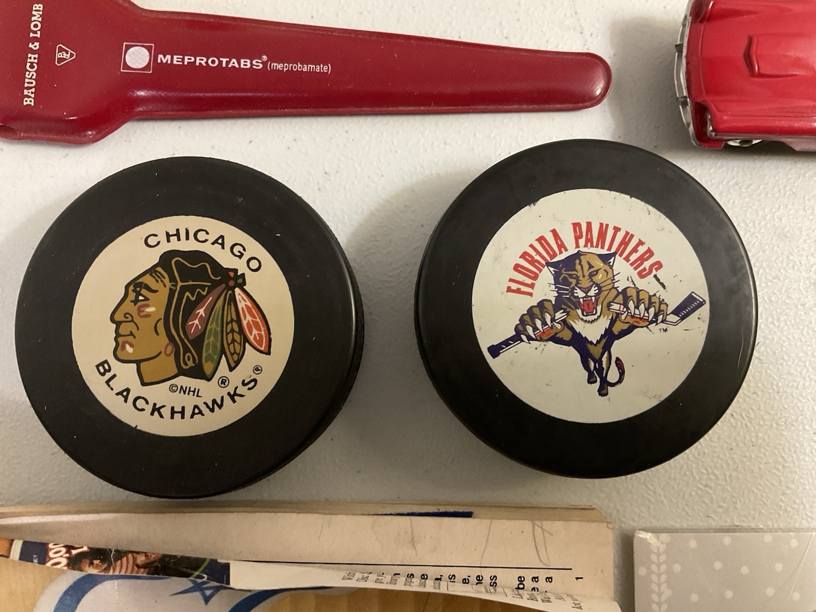 Vintage large junk drawer Lot NHL hockey pucks action figures Corgi Car Misc.