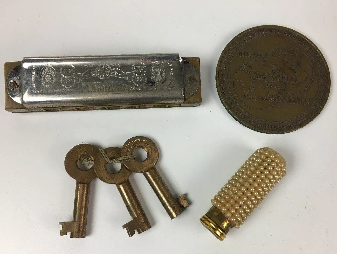 Mixed vintage lot – Hohner harmonica, Revlon, Eagle lock keys, Presbytarian coin